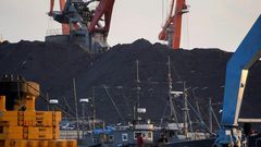 Ships and coal are seen at Rajin harbour in North Korea's northeastern city of Rason in 2017