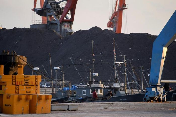 Ships and coal are seen at Rajin harbour in North Korea's northeastern city of Rason in 2017