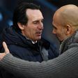 Manchester City manager Pep Guardiola (right) with former Arsenal boss Unai Emery