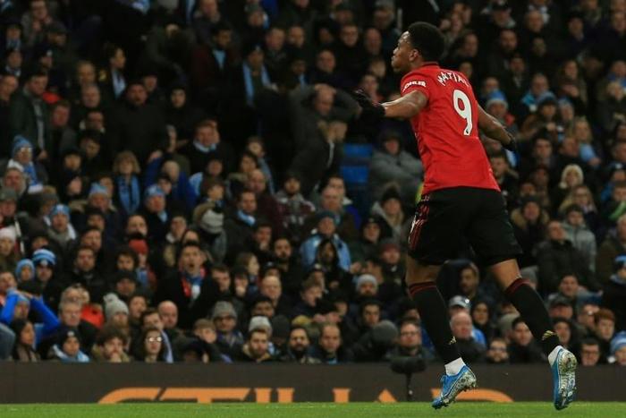 Anthony Martial celebrates Manchester United's second goal against Manchester City