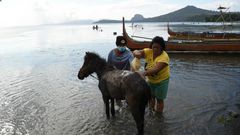 Taal's community had to flee without their prized ponies and most of their possessions when the volcano errupted