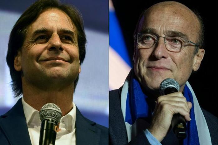 Polls show that Uruguay's presidential candidate Luis Lacalle Pou (L), is likely to triumph over Daniel Martinez (R)