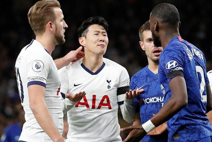 Red card woe - Tottenham Hotspur's Son Heung-Min (C) reacts beside Chelsea defender Antonio Rudiger (R) as he's sent off on Sunday