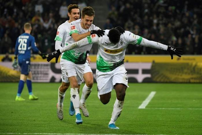 A brace from Moenchengladbach's Swiss forward Breel Embolo sent the side back atop the Bundesliga