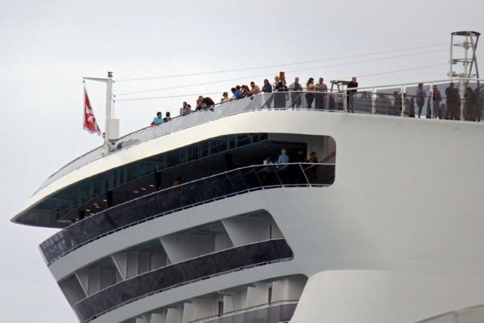 Passengers remain onboard the MSC Meraviglia cruise ship in Cozumel, Mexico, awaiting a decision on whether they can disembark