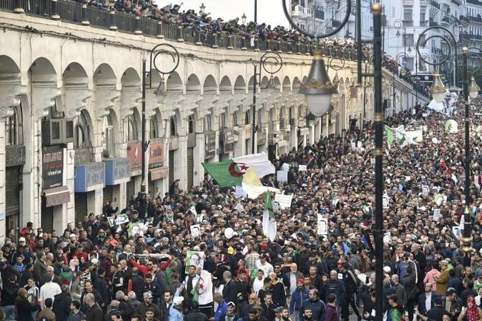 Algerian protesters take part in an anti-government demonstration in the capital Algiers on December 27, 2019 for the 45th Friday in a row