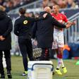 Monaco's Islam Slimani had to restrained after being shown a red card in Bordeaux. The Algerian scored but then conceded the decisive penalty