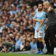 Manchester City midfielder Bernardo Silva (left) with manager Pep Guardiola