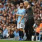 Manchester City midfielder Bernardo Silva (left) with manager Pep Guardiola