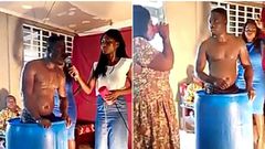 Ghanaian pastor bathes in church and members line up to drink his bathwater for anointing (video)