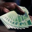 New Zimbabwe two-dollar notes have been issued to help ease a chronic cash shortage in the country