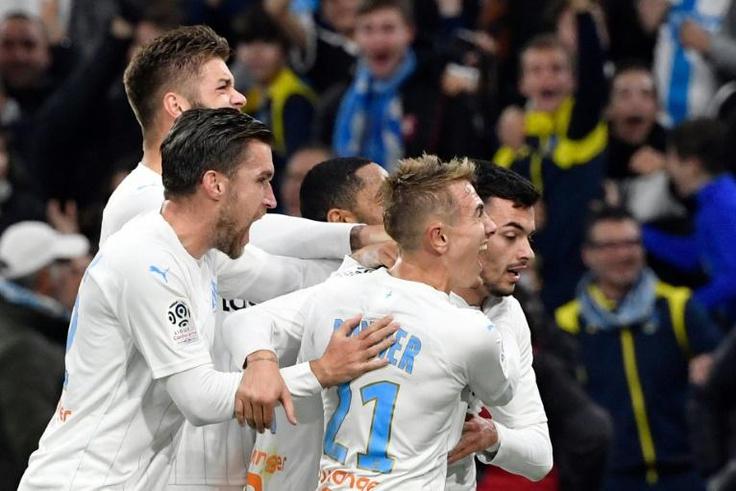 Radonjic's late goal pushes Marseille to within five points of PSG