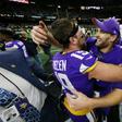 Minnesota Vikings quarterback Kirk Cousins, right, celebrates with Adam Thielen, left, after the Vikings defeated the New Orleans Saints 26-20 in the NFL playoffs Sunday