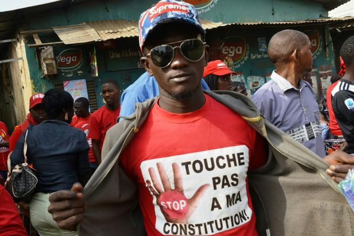 'Don't touch my Constitution !' - proposed reforms by Conde have triggered deadly protests