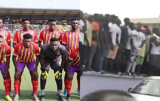 Hearts fans charge at players