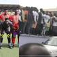 Hearts fans charge at players