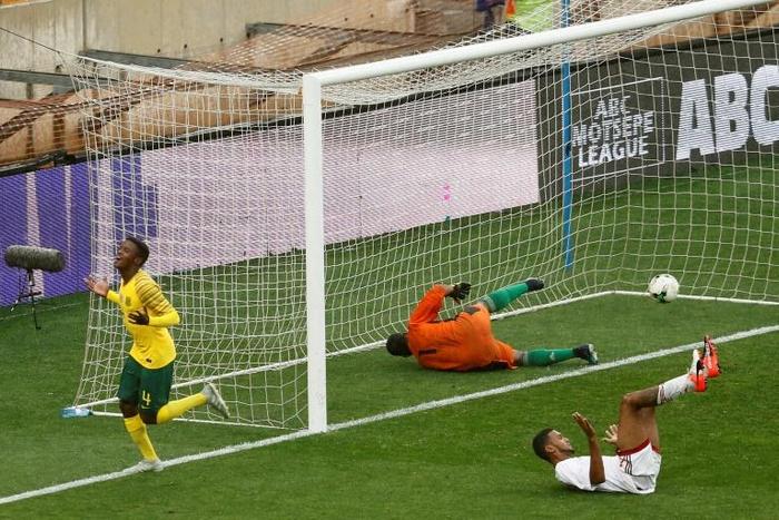 A file photo of South African Teboho Mokoena (L) celebrating scoring against the Seychelles in a 2019 Africa Cup of Nations qualifier