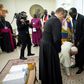 Pope Francis knelt to kiss the pair's feet during a stunning Vatican intervention in April