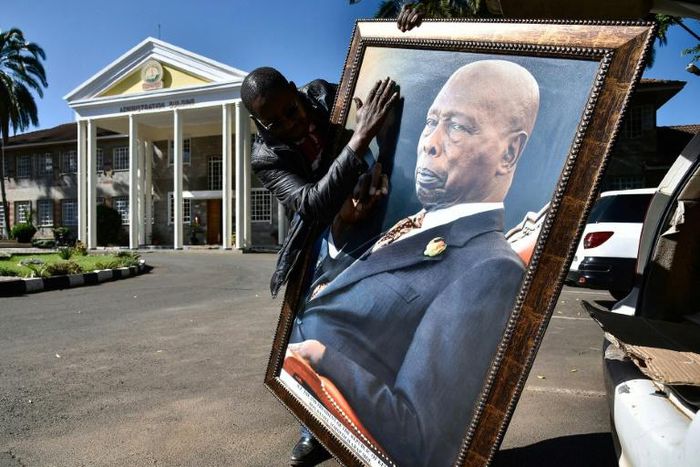 Daniel arap Moi, who towered over Kenya between 1978 and 2002, lay in state for three days in parliament, with tens of thousands of people filing past to pay their respects