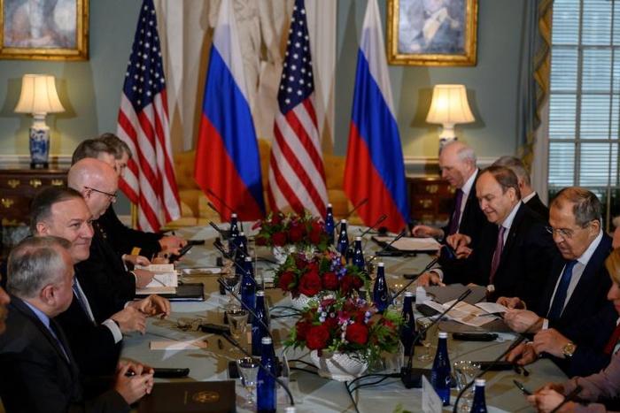 US Secretary of State Mike Pompeo (2ndL) meets with Russian Foreign Minister Sergey Lavrov (R) at the US State Department in Washington, DC on December 10, 2019.Russian Foreign Minister Sergei Lavrov on Tuesday opened a visit to Washington in which he ...
