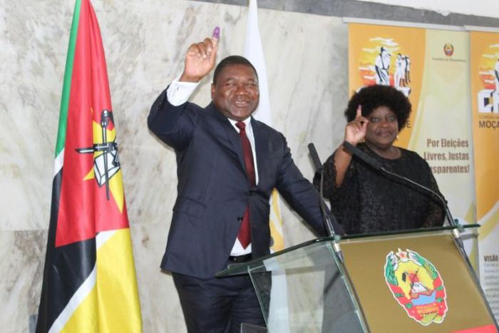 Mozambican President Felipe Nyusi (L) won a new five-year term in the election, though the opposition claimed massive fraud
