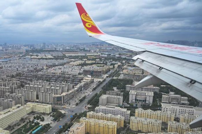 Xinjiang's capital Urumqi is seen from a passenger plane in September 2019
