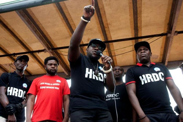 Timothy Mtambo (2nd-R) was the third protest activist arrested by police