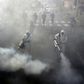 Firefighters disinfect streets in the Iranian capital Tehran in a bid to stem the spread of the coronavirus