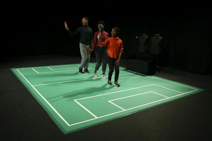 Actors Emile Clarke (left), Zara Gabbidon (centre) and Sabrina Laurison (right) perform 'Getting the Third Degree' in Cardiff