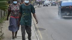 People scrambled to buy face masks and hand sanitiser in Lagos after sub-Saharan Africa's first case of coronavirus was detected