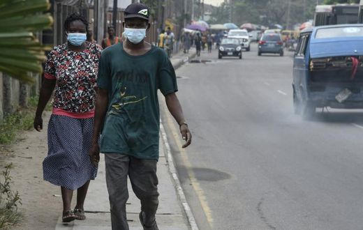 People scrambled to buy face masks and hand sanitiser in Lagos after sub-Saharan Africa's first case of coronavirus was detected