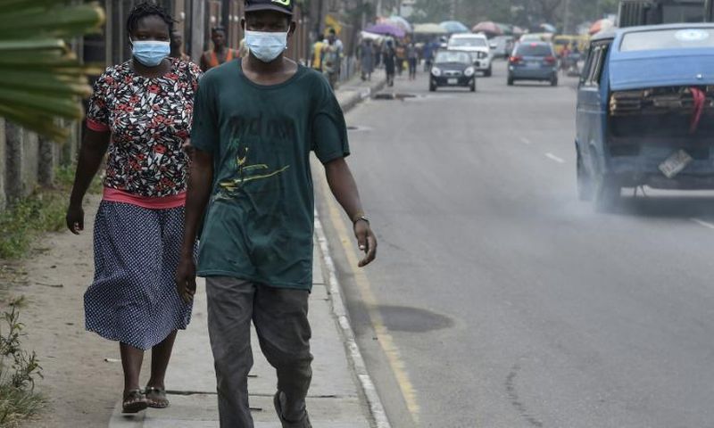 People scrambled to buy face masks and hand sanitiser in Lagos after sub-Saharan Africa's first case of coronavirus was detected