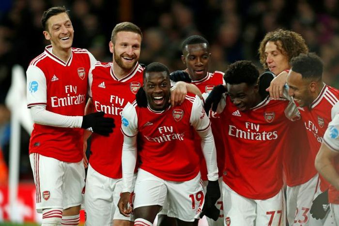 Nicolas Pepe (centre) celebrates Arsenal's second goal in a 4-0 win over Newcastle