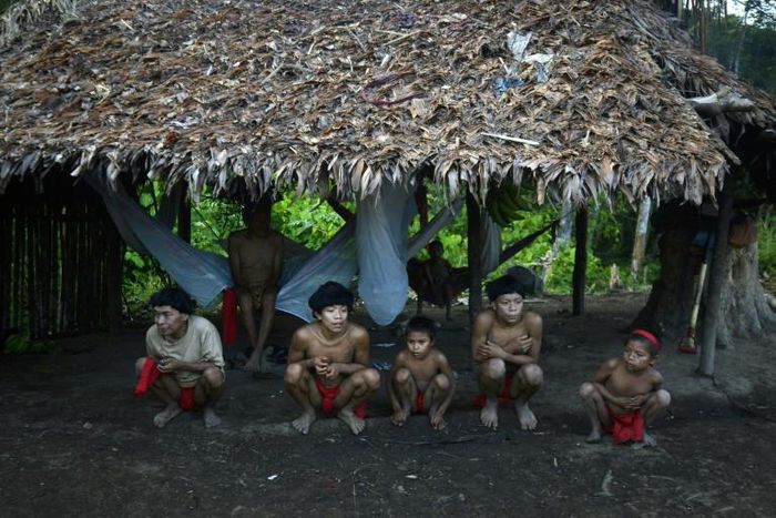 Yanomami natives in a hut  in Amazonas state, southern Venezuela, 19 km away from the border with Brazil, on September 7, 2012