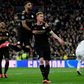 Kevin de Bruyne (right) celebrates scoring a winning penalty as Manchester City beat Real Madrid 2-1 on Wednesday at the Santiago Bernabeu.