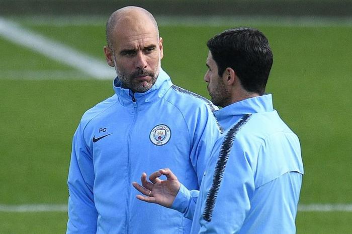 Manchester City manager Pep Guardiola (left) and assistant coach Mikel Arteta