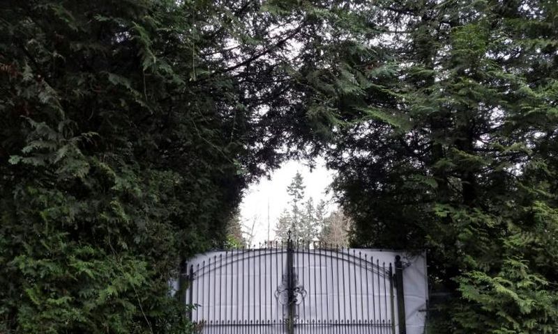 A shielded gate at the entrance of Meghan and Prince Harry's temporary home in North Saanich, Canada
