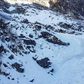 View from a helicopter of the avalanche site. Drones have also been deployed in the search, which has been hampered by deep snow