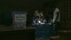 Electoral officials count votes after the February 2020 general and municipal elections in Yaounde, Cameroon