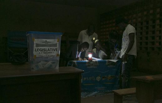 Electoral officials count votes after the February 2020 general and municipal elections in Yaounde, Cameroon