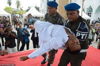 Man who fainted during 100 lashes for premarital sex was revived to take the rest before being rushed to the hospital