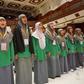 Students assembled in a university auditorium to practice ballads specially written for the pontiff