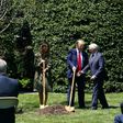 US President Donald Trump and Vice President Mike Pence, accompanied by their wives, plant a tree at the White House to mark Earth Day despite their frequent criticism of environmentalists
