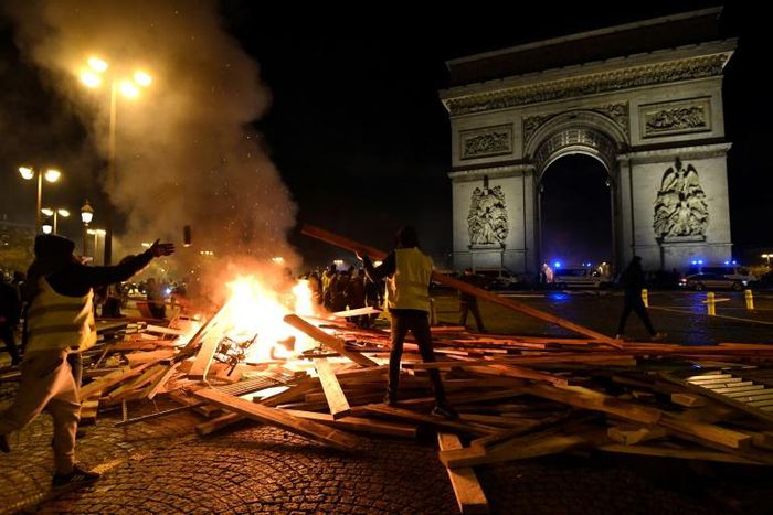 A yellow vest protest at the Arc de Triomphe on the Champs Elysees in Paris on November 24 last year