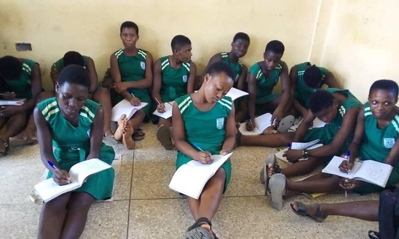 Photos: Lack of furniture forces Ningo SHS students to sit on bare floor to study
