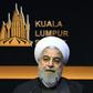 Iran's President Hassan Rouhani speaking during the opening ceremony of the Kuala Lumpur Summit of Muslim leaders
