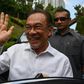 Anwar Ibrahim waves in Kuala Lumpur before announcing he was the preferred candidate of a parliamentary coalition