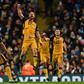 Port Vale striker Tom Pope (C) celebrates after scoring against Manchester City