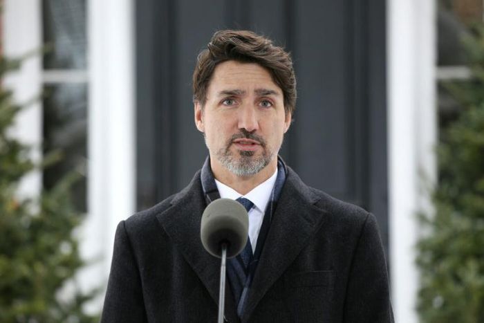 Canadian Prime Minister Justin Trudeau outside his residence in Ottawa announces Can$82 billion in direct aid and deferred taxes to help Canadians and businesses weather the COVID-19 pandemic.