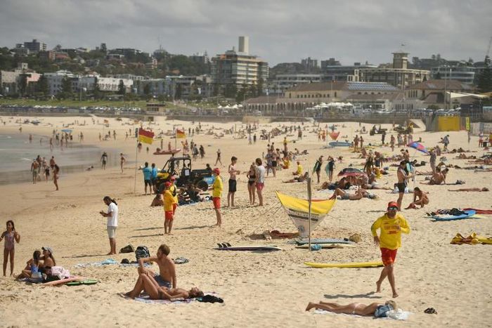 Bondi Beach was closed after sunbathers flouted a ban on non-essential outdoor gatherings of more than 500 people